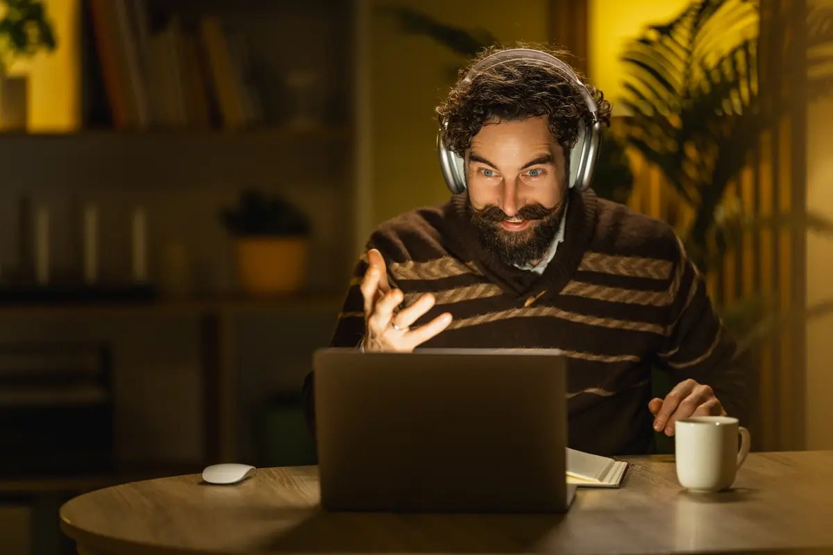 Man on a video call with headphones