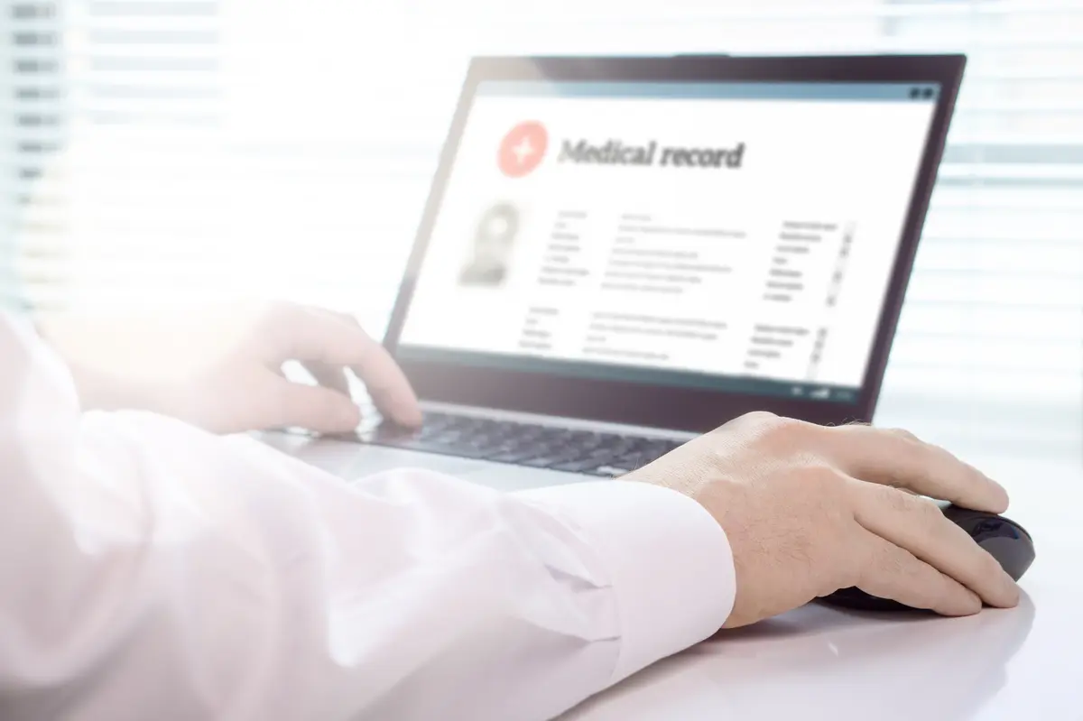 Medical record open on a laptop