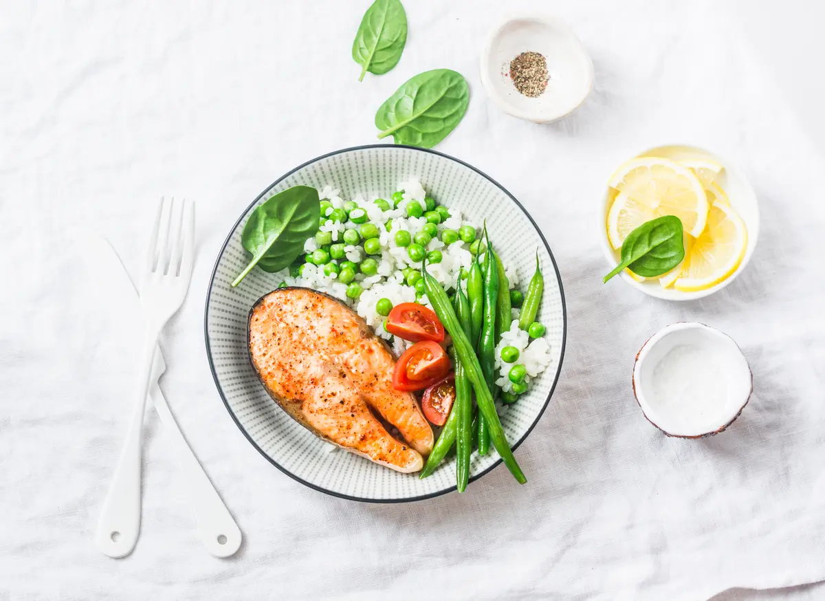 Plate of salmon, greens and peas