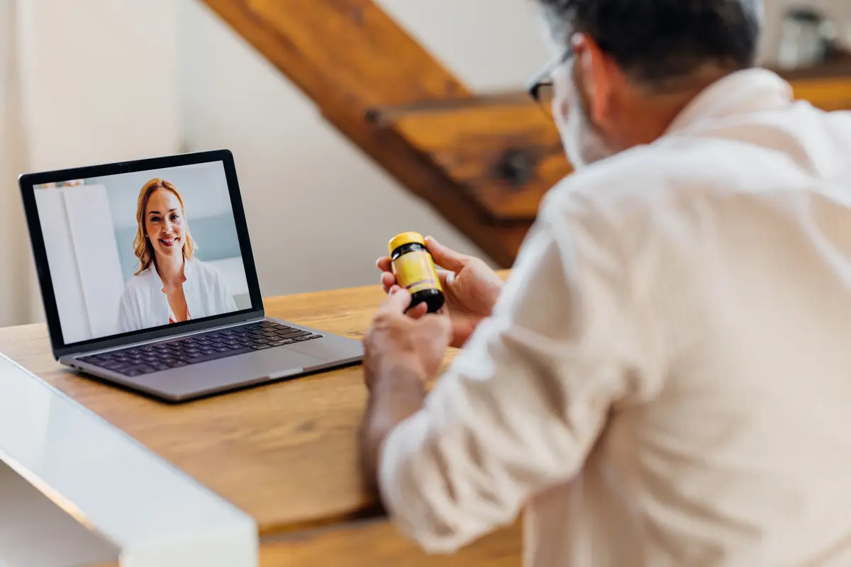 Video visit with a doctor on a laptop